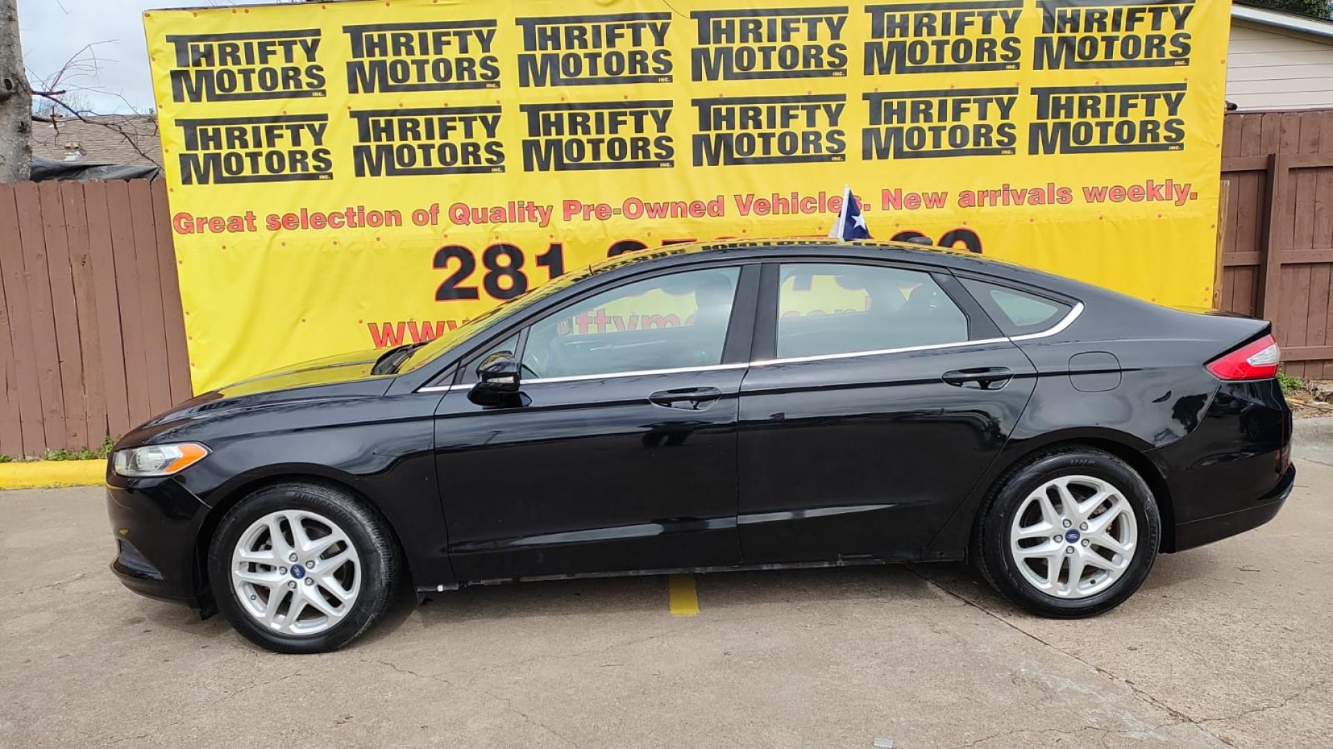 2016 Ford Fusion SE (3FA6P0HD8GR) with an 1.5L L4 DOHC 16V engine, 6-Speed Automatic transmission, located at 16710 Clay Rd., Houston, TX, 77084, (281) 859-7900, 29.834864, -95.656166 - Photo#0